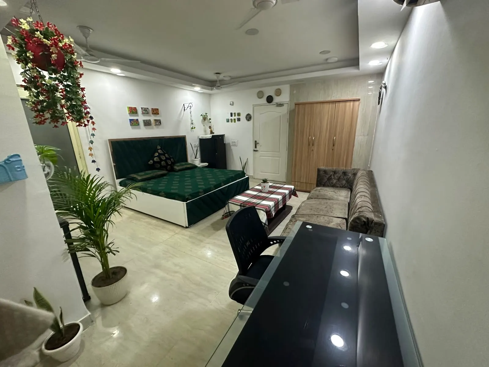 Seating area and work desk beside the wardrobe