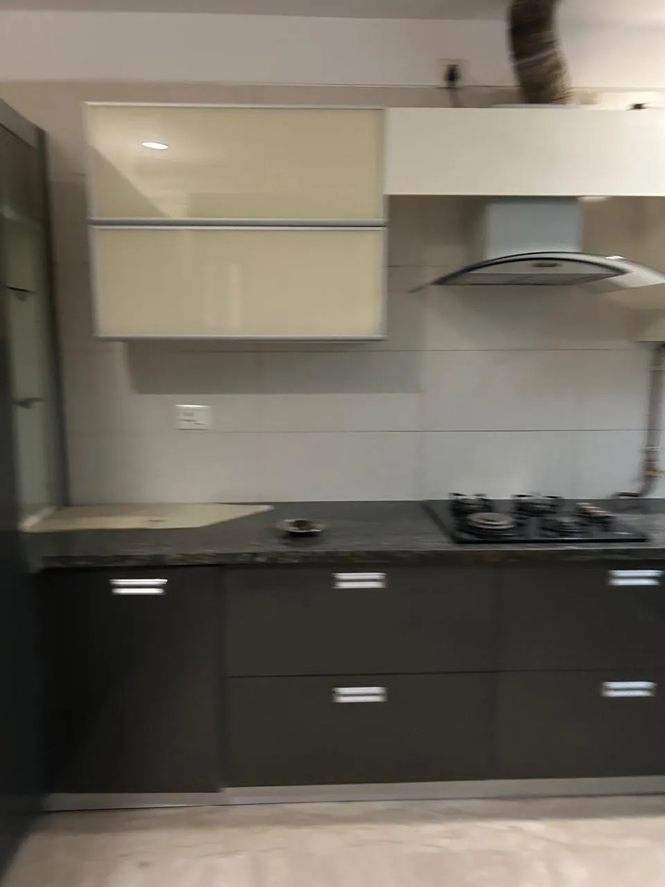Modular kitchen with chimney and gas hob