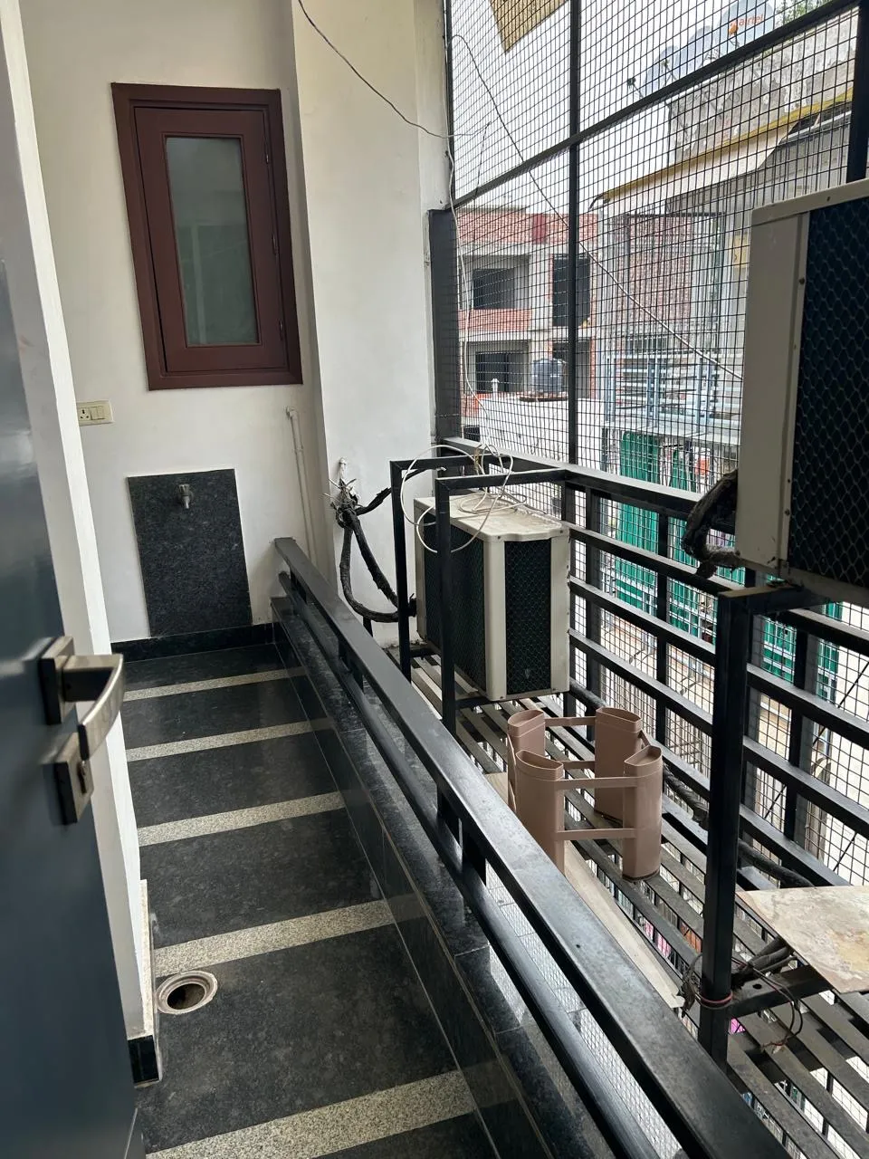 Service balcony with utility space